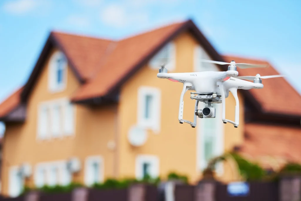 How can I effectively use drones in my real estate photography