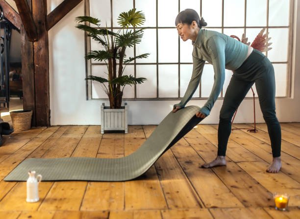 Preparing a young Japanese woman for meditation at home