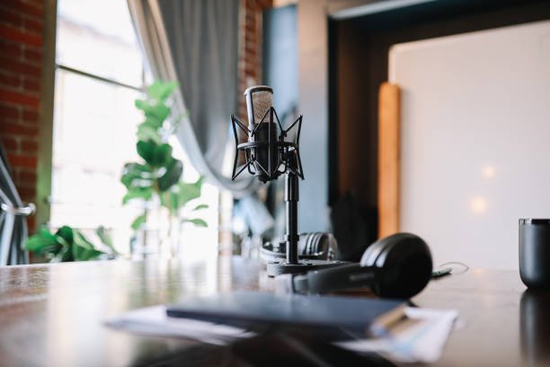 Standing mic and audio equipment in the online podcast studio